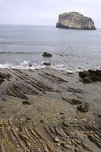 圣胡安德加兹特鲁加特地区海洋海滩海岸线石头海岸港口隐士岩石银行图片