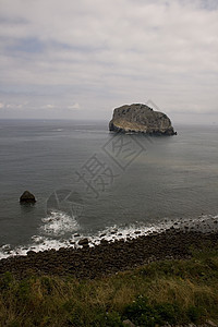 圣胡安德加兹特鲁加特港口悬崖海岸线海滩隐士岩石海洋海岸石头支撑图片