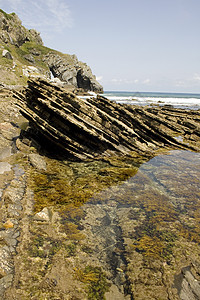 圣胡安德加兹特鲁加特港口隐士海岸线支撑悬崖海滩地区岩石海洋石头图片