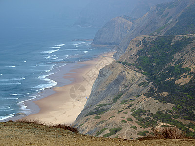 阿尔加夫省比拉多比斯波附近的普拉亚多科多阿马岩石海岸场景海岸线旅行海洋悬崖支撑海滩图片