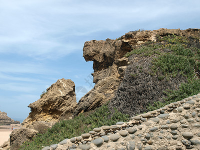 葡萄牙阿尔加夫附近海洋旅行悬崖岩石支撑海岸线场景海滩海岸图片