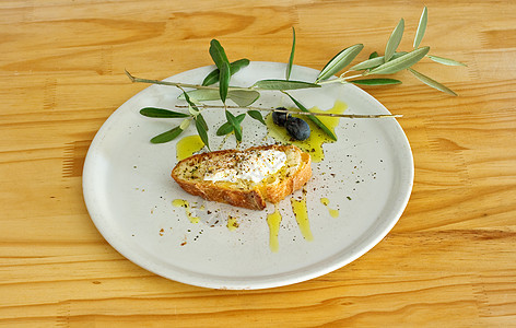 面包 里冰塔 油油和橄榄油食物叶子小吃农场早餐烹饪团体农业美味橄榄绿图片