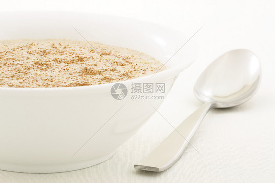 健康和美味的燕麦粥葡萄干薄片牛奶营养小吃膳食早餐奶制品产品麦片图片