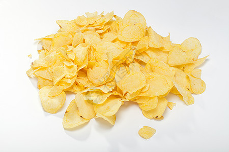 白背景孤立的土豆薯片色彩食物黄色美食油炸饮食小吃白色波纹宏观图片