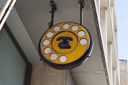 旧意大利语电话符号民众总机教导黄色标志信号圆圈图片