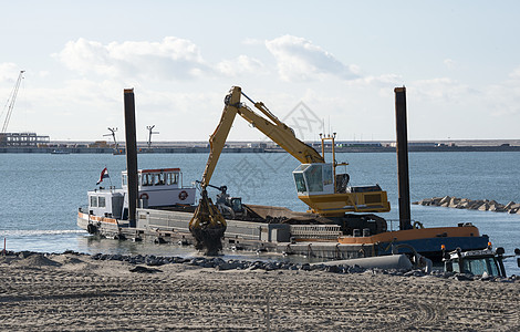 在荷兰Europort工作的挖泥船力量搬运工植物疏浚支撑血管导航驳船海岸工程图片