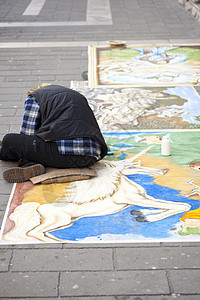 麦当纳罗画家男人街道路面行动艺术家绘画图片