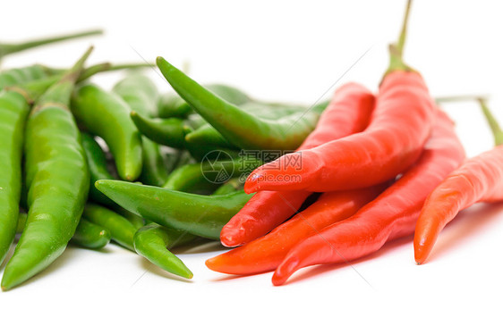 红辣椒和绿辣椒胡椒蔬菜香料烹饪白色红色绿色绿色植物食物辣椒素图片
