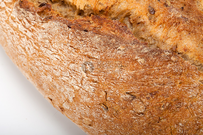 传统烤熟面包的大型小面包美食食物早餐纤维乡村宏观脆皮植物小麦种子图片