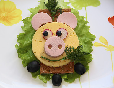 桑威奇猪鼻 儿童食品粉色绿色香肠微笑黑色孩子们面包盘子乐趣黄色图片