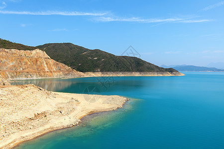 蓄水池天空美丽太阳蓝色损失岩石日落水库海浪黑色图片