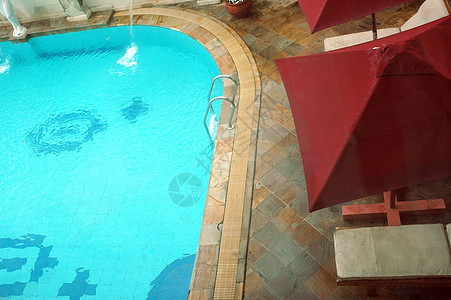 游泳池异国天堂酒店温泉天空海浪旅行太阳后院甲板图片