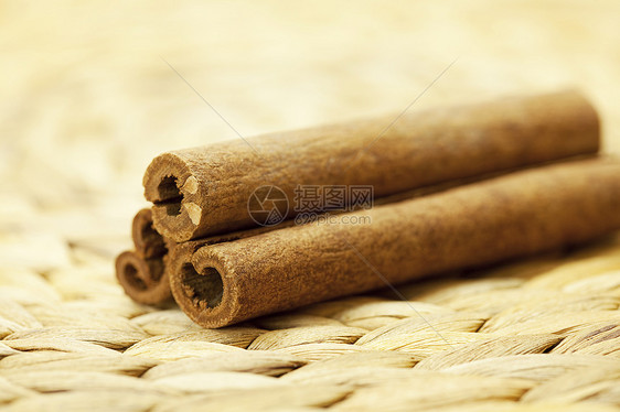 肉桂棍在维勒垫子上棕色种子摄影空白长方形衣服框架帆布食物面包图片