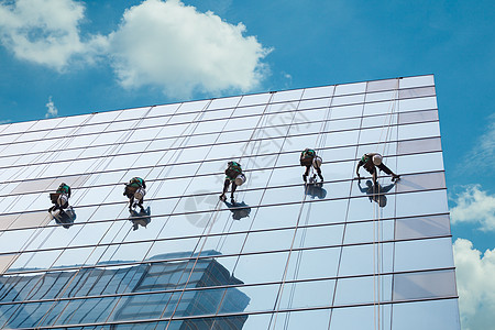 高楼的清洁窗户服务工人群体在高楼大楼内打扫窗户服务垫圈摩天大楼商业镜子场景办公室团体清洁工工作建筑图片