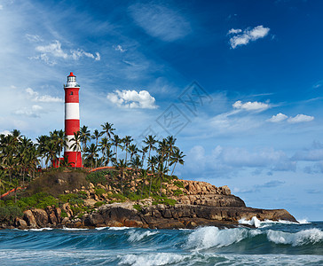 KovalamVizhinjam灯塔 印度喀拉拉海洋支撑风暴波浪建筑学天气棕榈海湾海岸线旅游图片