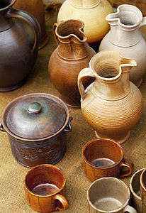 土器罐头站在衣布上水壶收藏陶器市场软件艺术黏土文明陶瓷曲线图片