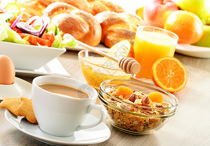 早餐 包括咖啡 面包 蜂蜜 橙汁 梅斯利a橙子盘子桌子种子牛奶厨房均衡玻璃健康饮食图片