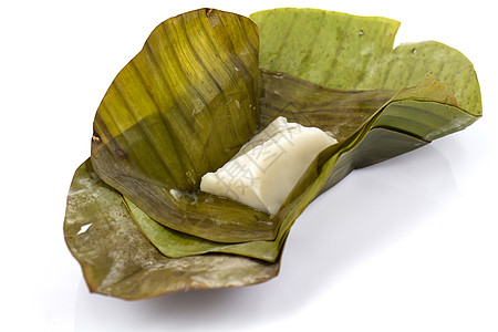 泰国甜点民间食物绿色糖类食品包装小吃白色别针蜜饯背景图片