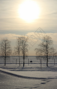 风景冬季海滩身体大雪全景场景天空日落浮冰天气海景城市图片