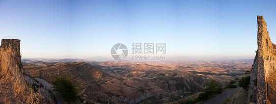 西西里阿索罗镇山脉农村共同点高度废墟城堡太阳土地全景爬坡图片