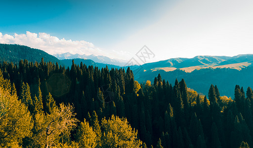 自然及自然资源地点山脉山峰天空阳光薄雾土地旅行太阳图片