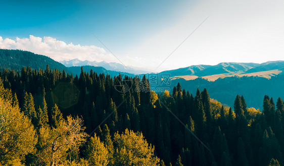 自然及自然资源地点山脉山峰天空阳光薄雾土地旅行太阳图片