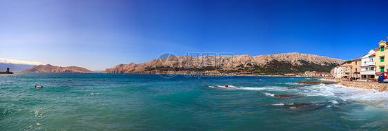 克罗地亚巴斯卡棕褐色远景波浪沿海假期旅行天蓝色荒野蓝色海滩图片