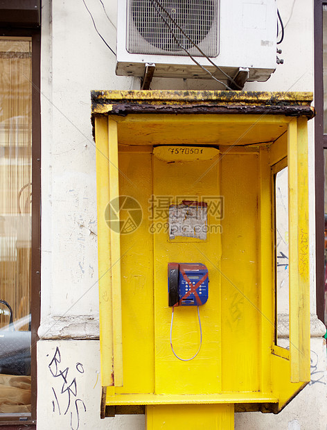 黄色公共电话讲话按钮数字技术街道货币情况听筒硬币电讯图片