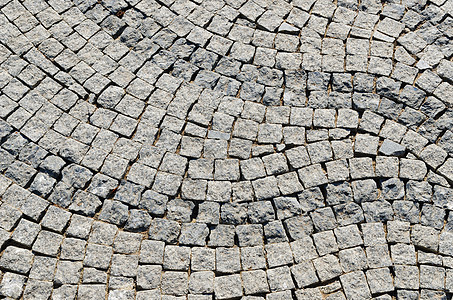混布道路作为背景街道驾驶阳光材料岩石城市花岗岩通道车道马赛克图片