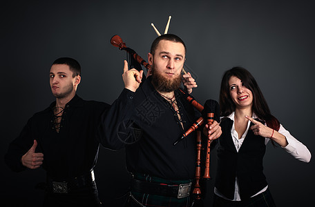 苏格兰音乐乐队吹笛者戏服团体女士裙子夹克男人女性鼓手乐器图片