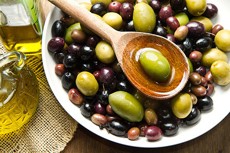 橄榄油勺子玻璃水果处女叶子瓶子餐厅植物环境烹饪图片