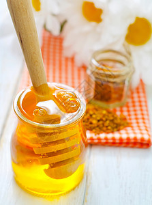 花粉和蜂蜜勺子灰尘营养盒子食物药品金子桦木蜂房治愈图片