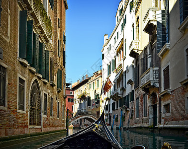 美丽的水上街道     意大利威尼斯蜜月艺术运河巴士阳光蓝色奶奶传统游客太阳图片
