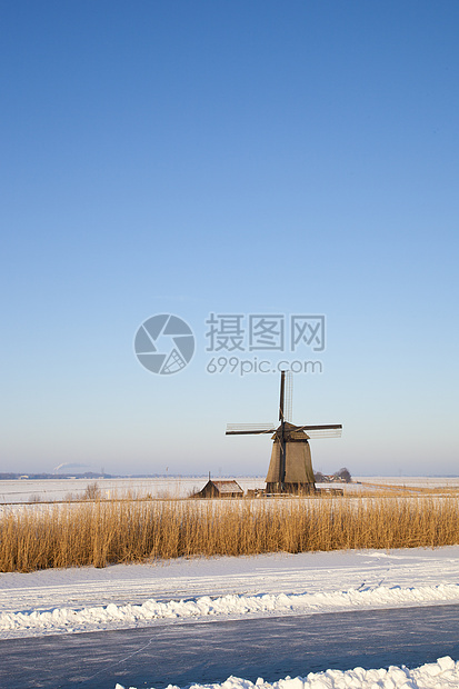 冬季风车 有雪 冰和蓝天空风景建筑学建筑房子农村历史性地标天空刀刃图片