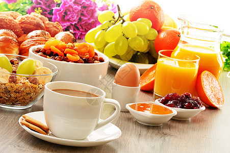 早餐 包括咖啡 面包 蜂蜜 橙汁 梅斯利a香蕉饮食玻璃厨房橙子种子餐厅坚果杂货店桌子图片