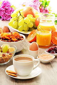 早餐 包括咖啡 面包 蜂蜜 橙汁 梅斯利a杯子厨房饮食粮食种子果汁桌子盘子水果坚果图片