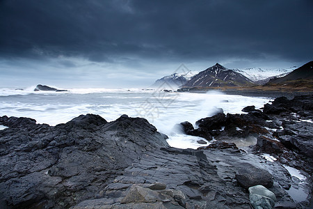 东南冰原的暴风海力量蓝色支撑荒野海岸线戏剧性天空灾难海岸天气图片