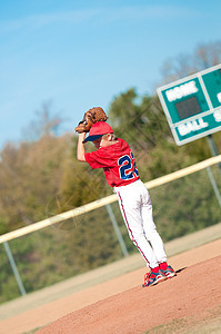 青年棒球投手运动联盟球衣玩家手套图片