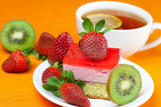 柠檬茶 基威茶 蛋糕和草莓飞碟糖果杯子织物奢华水果巧克力餐具液体橙子图片