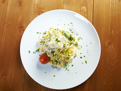 费特奇内阿尔弗雷多宏观素菜火腿桌子烹饪意大利人食物照片切菜板面条背景图片