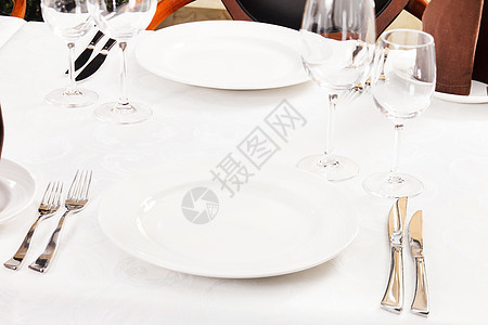 餐桌晚餐招待会座位酒吧家具房间盘子银器早餐餐厅图片