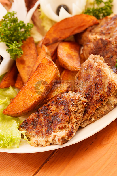 用蔬菜烤肋排烹饪洋葱午餐肋骨猪肉沙拉牛肉正方形土豆香菜图片