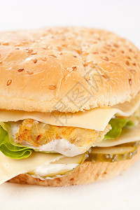 盘子里的芝士汉堡食物营养种子蔬菜小吃包子野餐芝麻面包晚餐图片