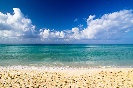 海滩沙滩天堂海岸晴天支撑海浪蓝色冲浪假期天空热带图片