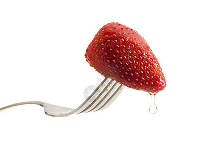 叉子上的草莓宏观食物红色白色水果水滴营养图片