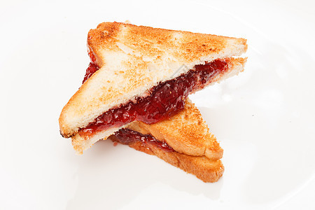 果冻三明治小麦传播坚果育肥早餐覆盆子营养棕色饮食午餐图片