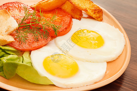 带蔬菜的炒鸡蛋面包美食早餐营养午餐土豆草本植物食物油炸橙子图片