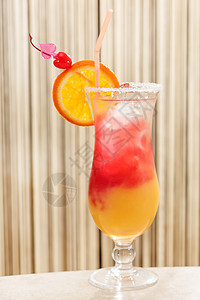 橙色鸡尾酒酒吧玻璃热带日出假期白色游客派对奢华水果图片