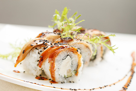 鳗鱼寿司好吃的寿司筷子海藻美食午餐黄瓜食物文化用餐芝麻海鲜背景