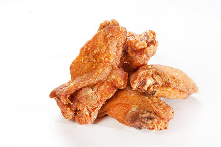 炸鸡食物白色棕色油炸午餐香料翅膀小吃背景图片
